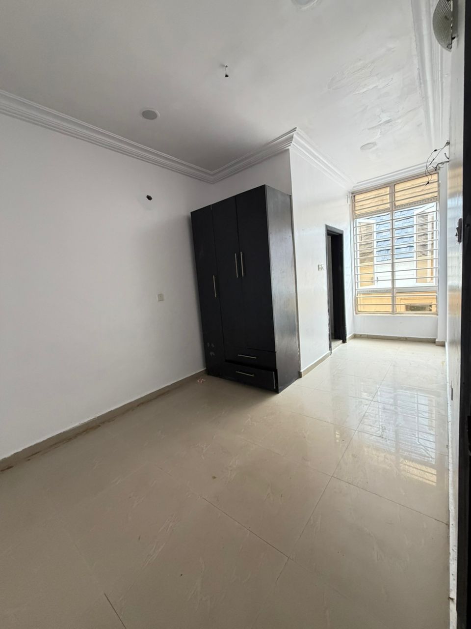 Studio room For Rent in Lekki Phase 1, Lagos — ₦1,800,000/year | GidiStay — 1 bed studio in Lekki Phase 1, Lagos (bedroom view)