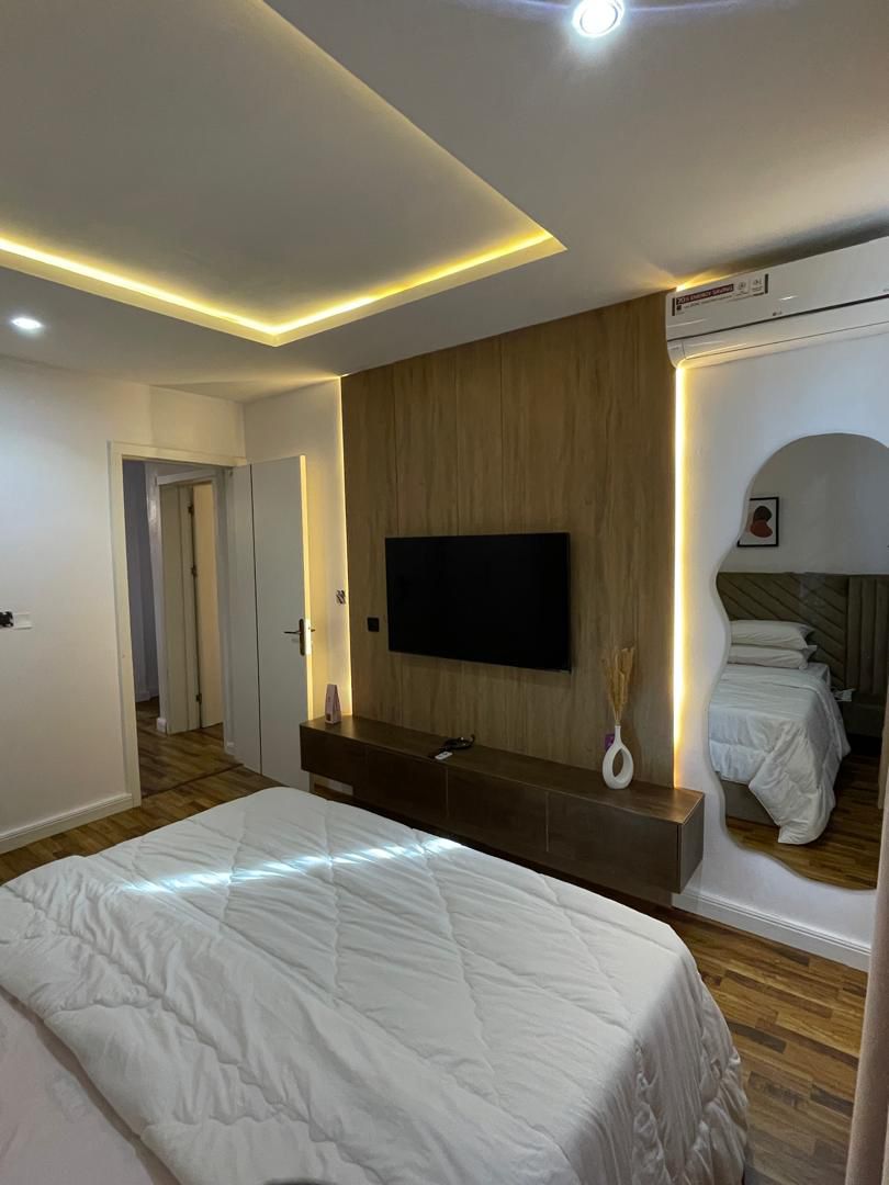 🏙️✨ EXPERIENCE DUBAI LUXURY IN LEKKI! ✨🏙️ 🌟 Luxury 2-Bedroom Shortlet Apartment 📍 Ikate, Lekki Phase 1, Lagos Looking for comfort, luxury, and uninterrupted power? This stunning apartment offers everything you need for a perfect staycation, business trip, or weekend getaway. ✅ 24/7 Electricity Guaranteed ☀️ Solar Power System 🔋 Inverter Backup ⚡ NEPA Supply 🔌 Generator Backup 🚫 No excuses for power outage! 🏊 Swimming Pool 🛗 Elevator Access 🎮 PS5 Gaming Console 🛋️ Fully Furnished Luxury Interior 🌐 High-Speed Internet 🔒 Secure & Serene Environment 🚗 Ample Parking Space Whether you’re relaxing, working remotely, or creating unforgettable memories, this apartment delivers a world-class experience. 🌴 Come and Experience Dubai in Lagos, Nigeria 🇳🇬 💰 Price: ₦220,000 per Night✅ — ₦220,000/night | GidiStay — 2 bed apartment in Lekki Phase 1, Lagos (interior)